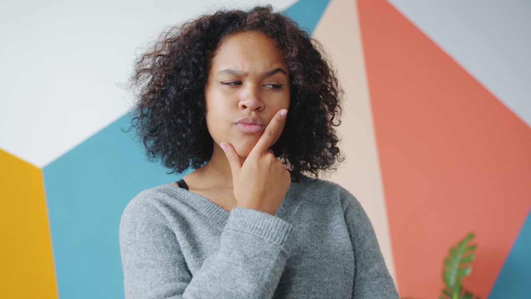 young woman choosing decision thinking