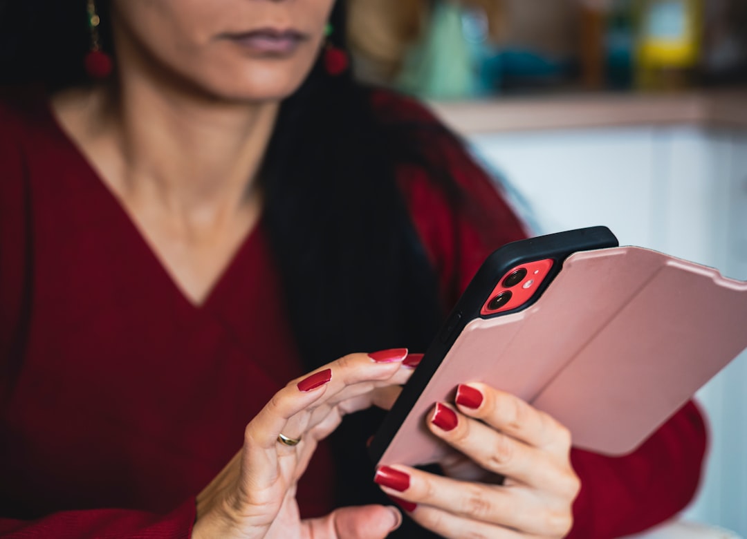 woman comparing dating apps on smartphone