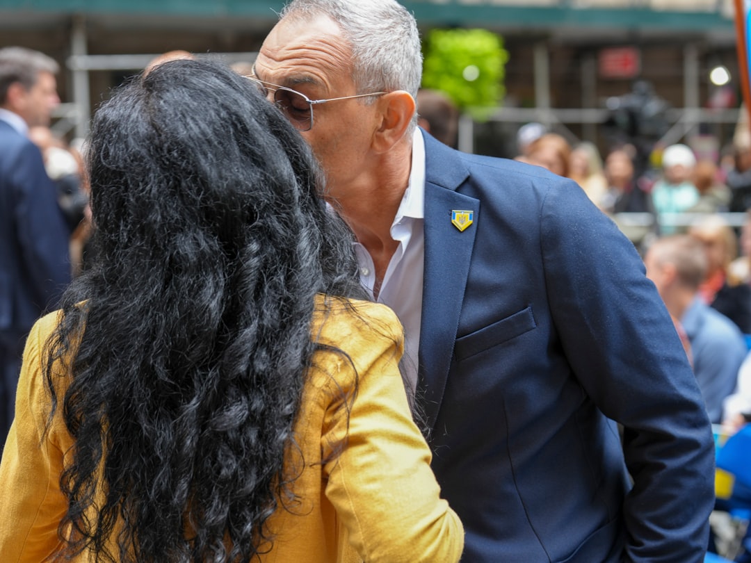 couple meeting at street event