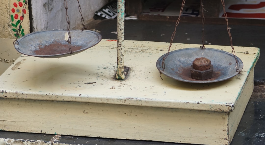 balance scale money comparison