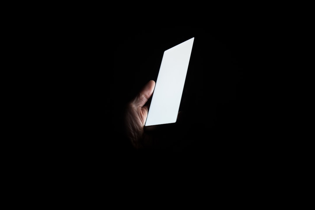 smartphone screen at night in dark
