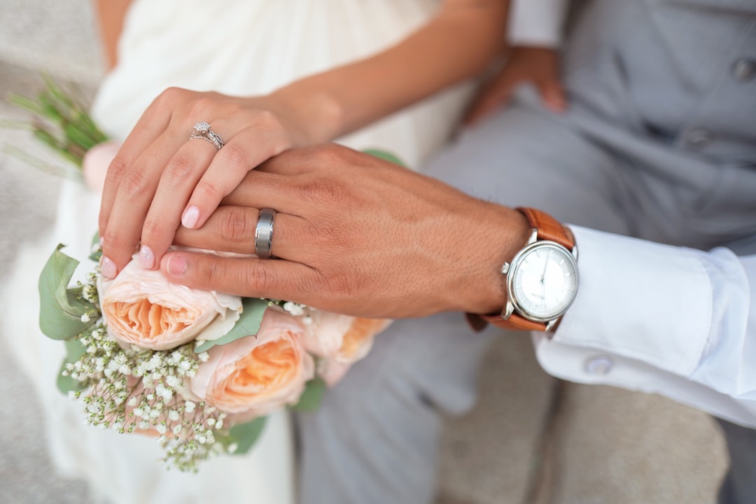 married couple wedding rings hands