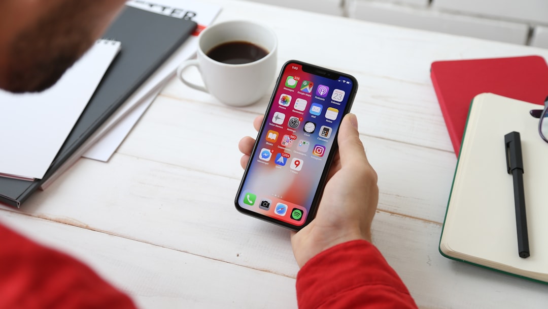 person deleting app from smartphone