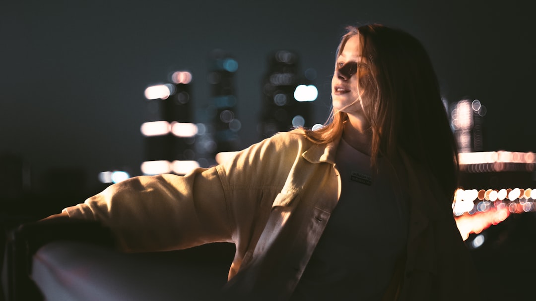 confident businesswoman thinking alone at night