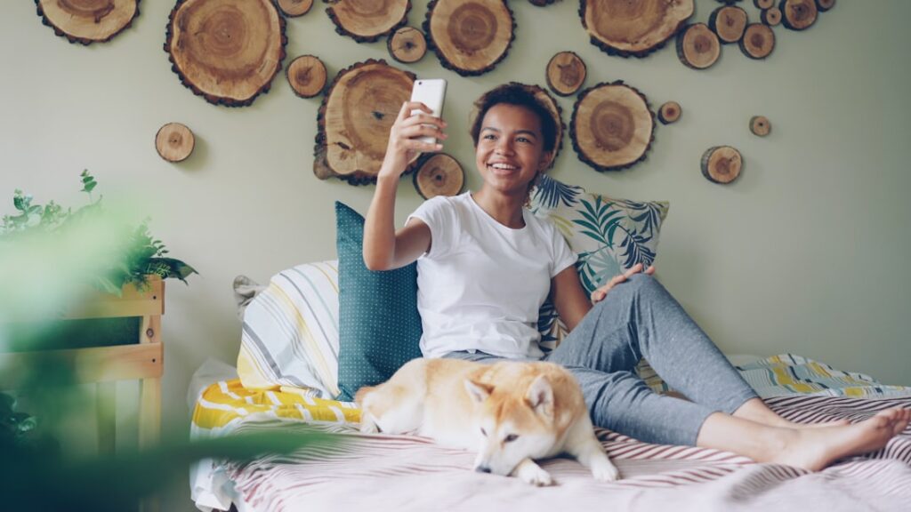 woman video call smartphone home