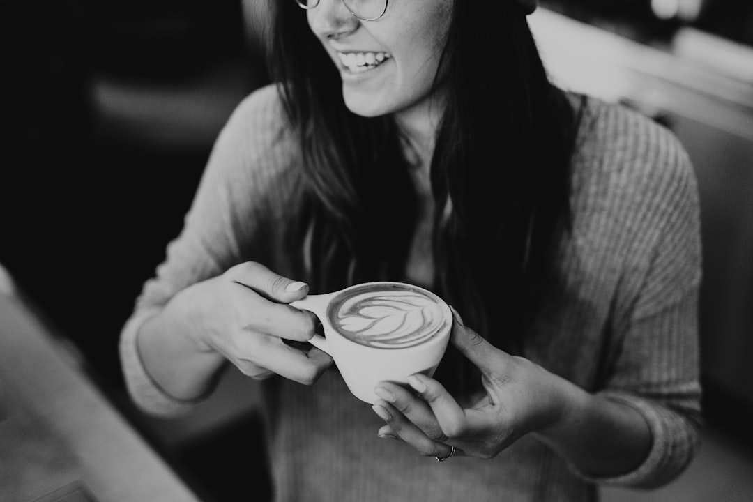 happy woman smiling with coffee testimonial