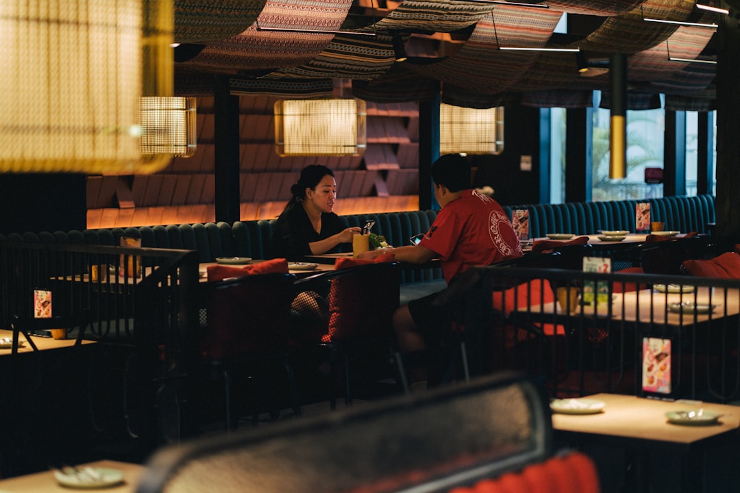 couple having conversation at restaurant date