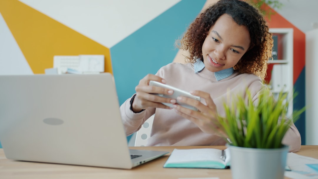 happy woman using smartphone dating app