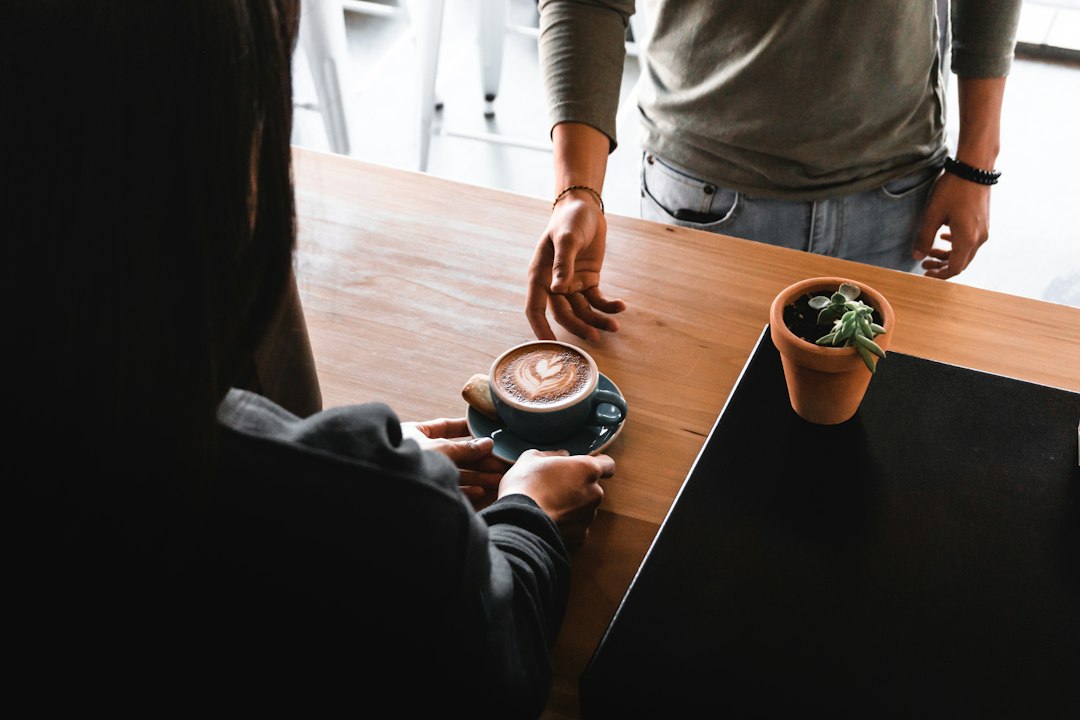 couple relaxed conversation coffee shop
