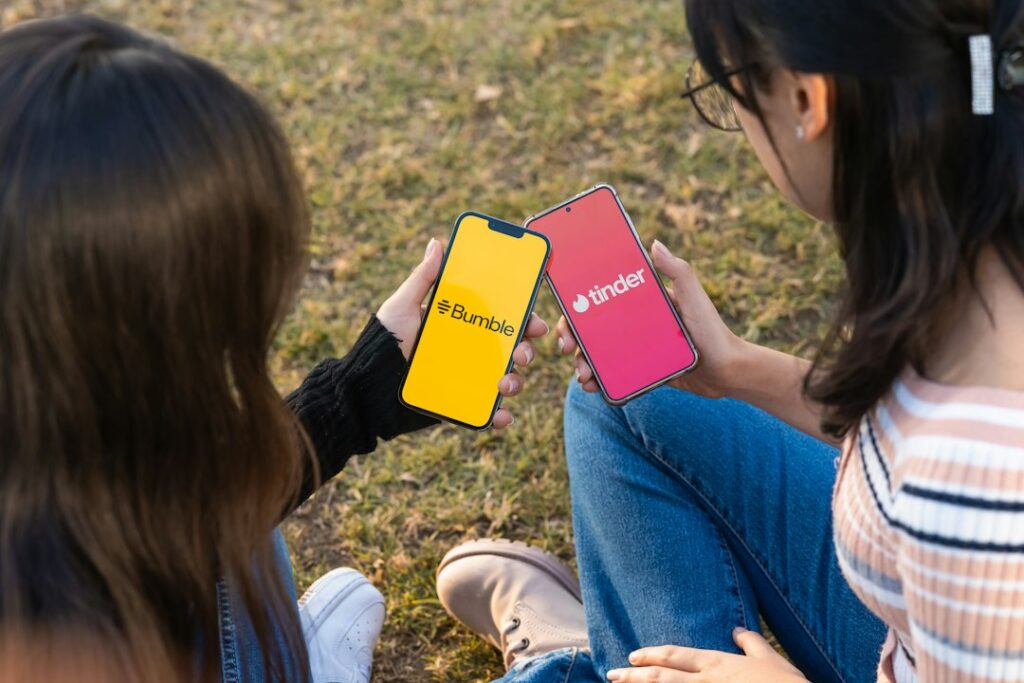two smartphones dating app comparison
