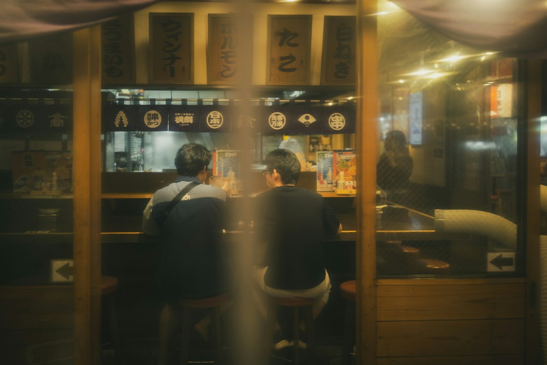 couple serious conversation restaurant japan