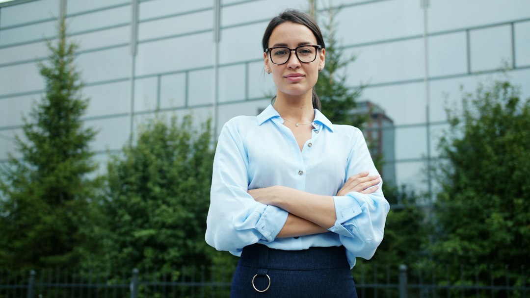 confident calm woman smiling outdoors