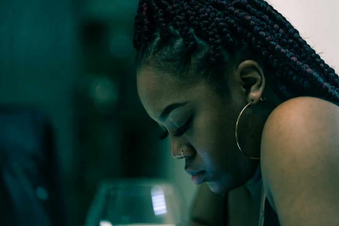 woman worried looking at phone night