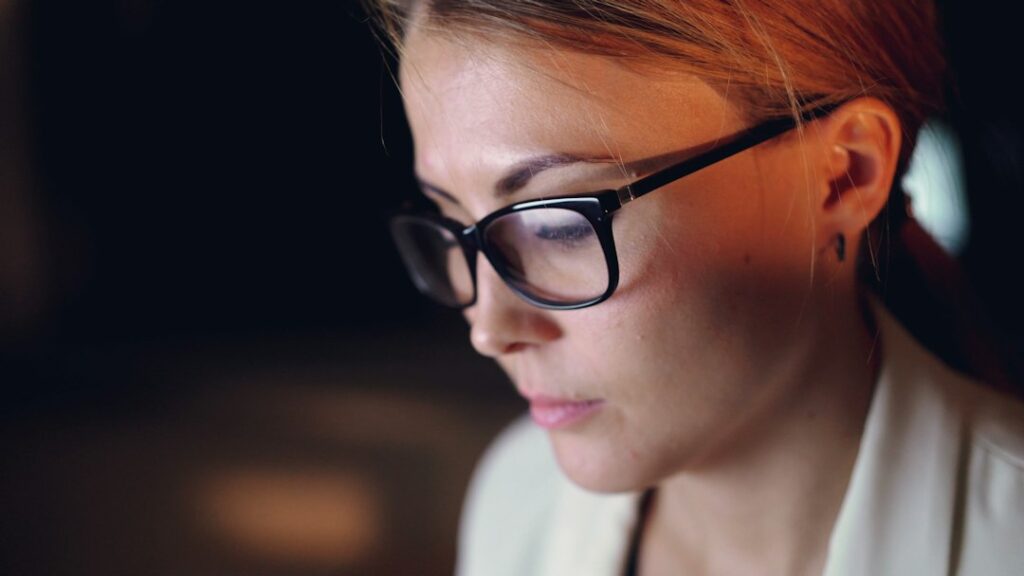 confident businesswoman working late office