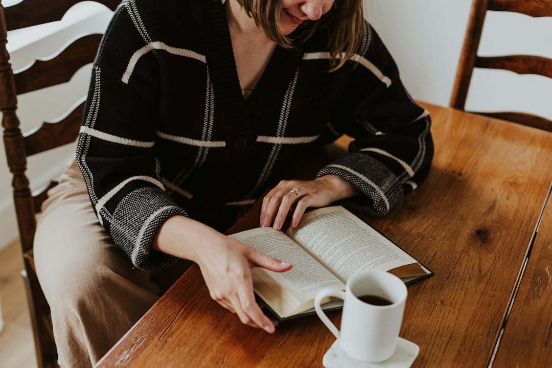 happy independent woman enjoying hobby coffee book