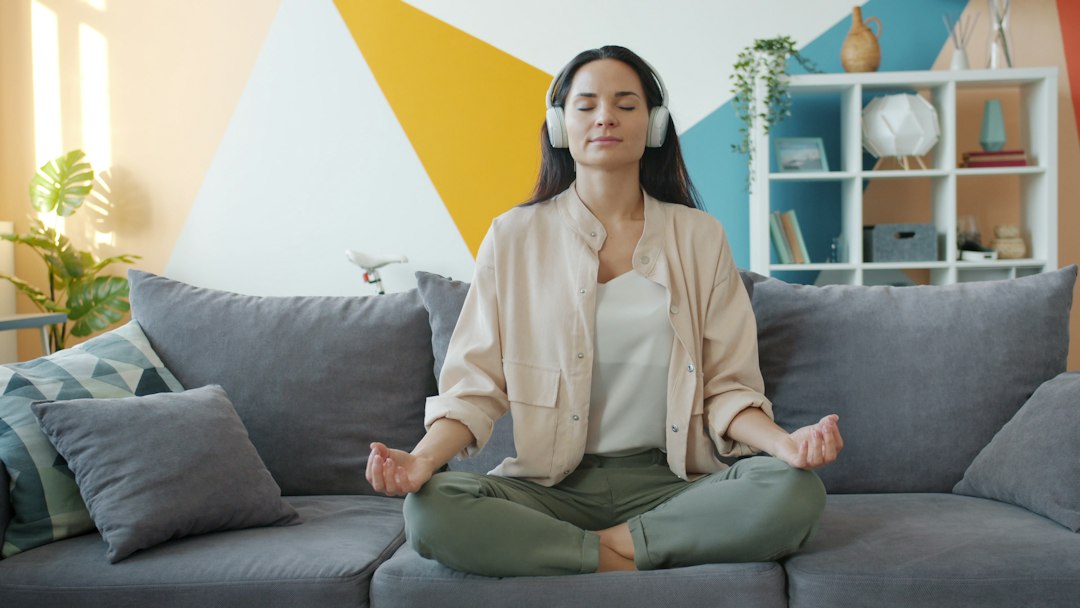woman deep breathing calm meditation at home