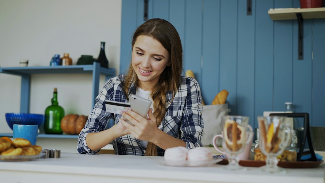 happy woman using smartphone smiling