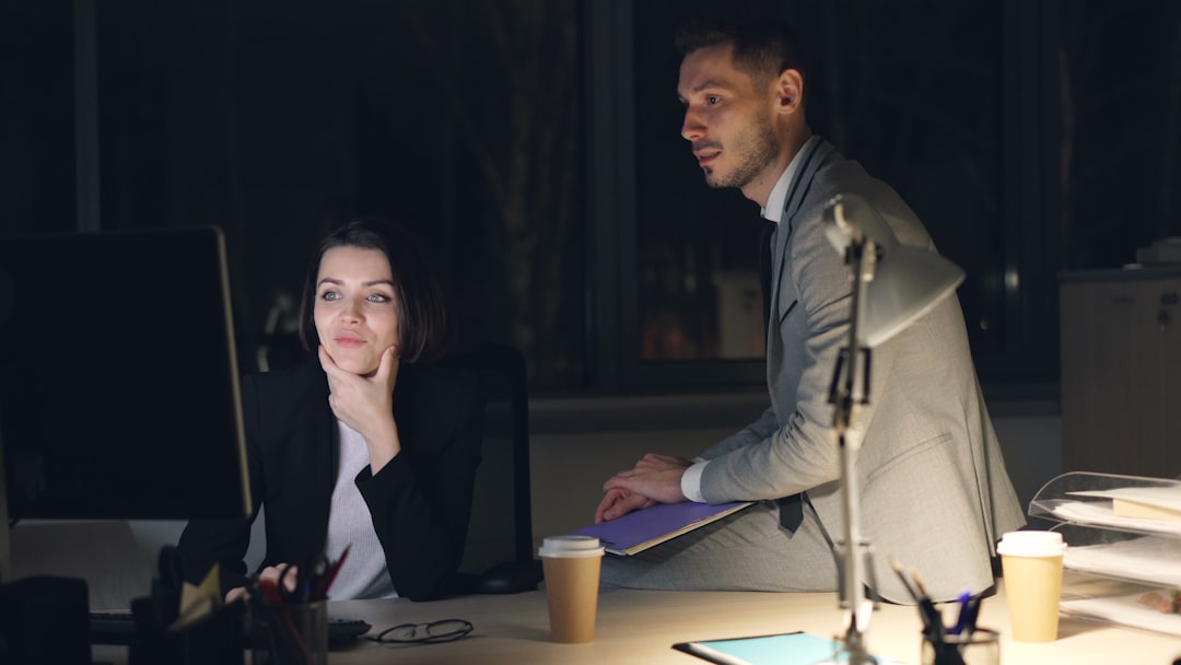 confident businesswoman working late office
