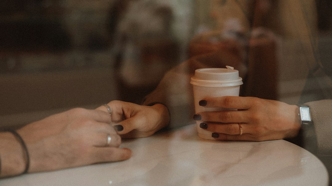 two people talking coffee date