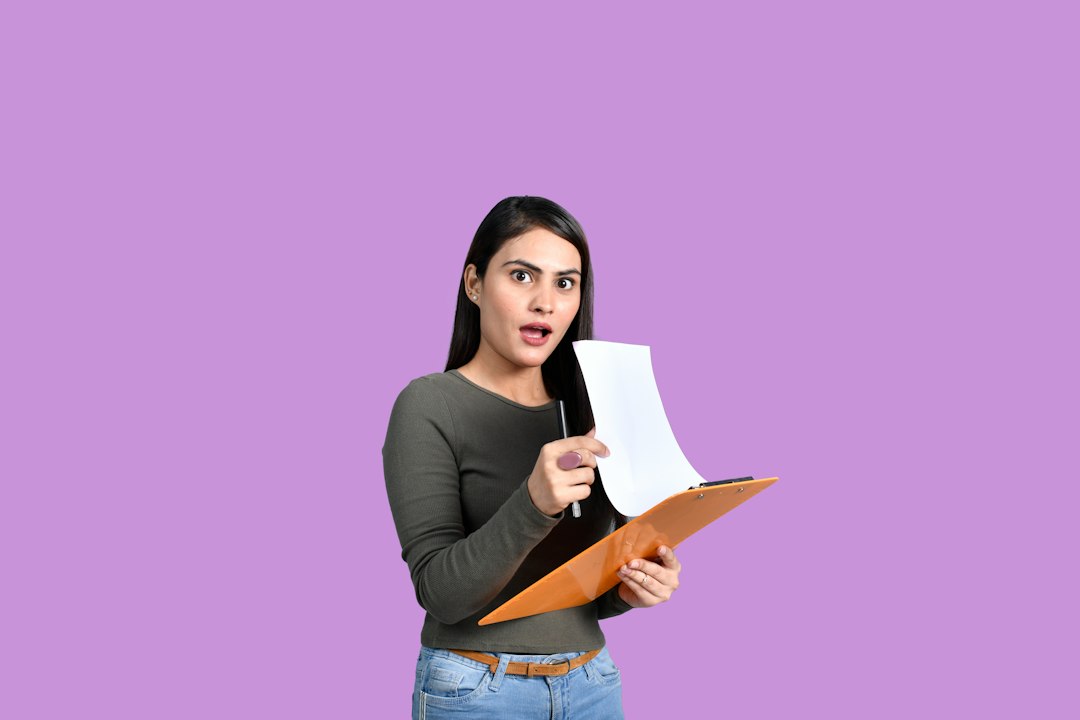 frustrated person holding document retry