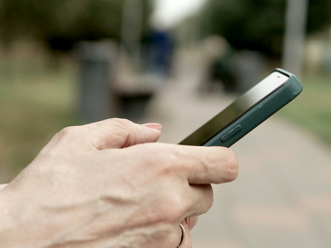 typing text message phone hands