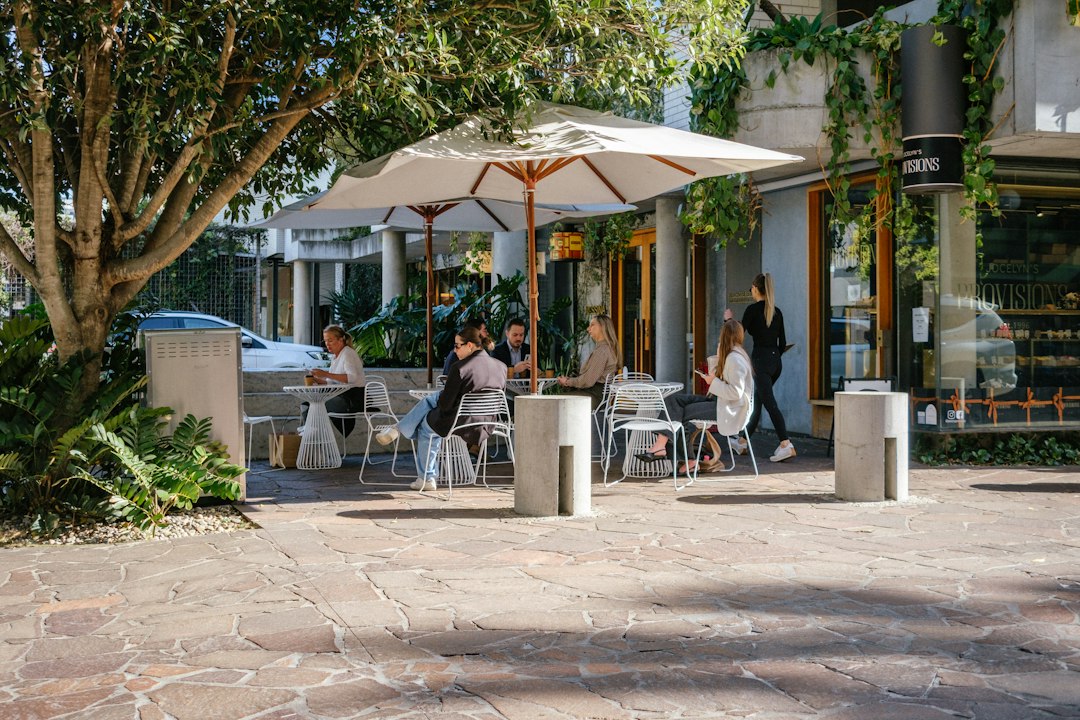 daytime outdoor cafe meeting people