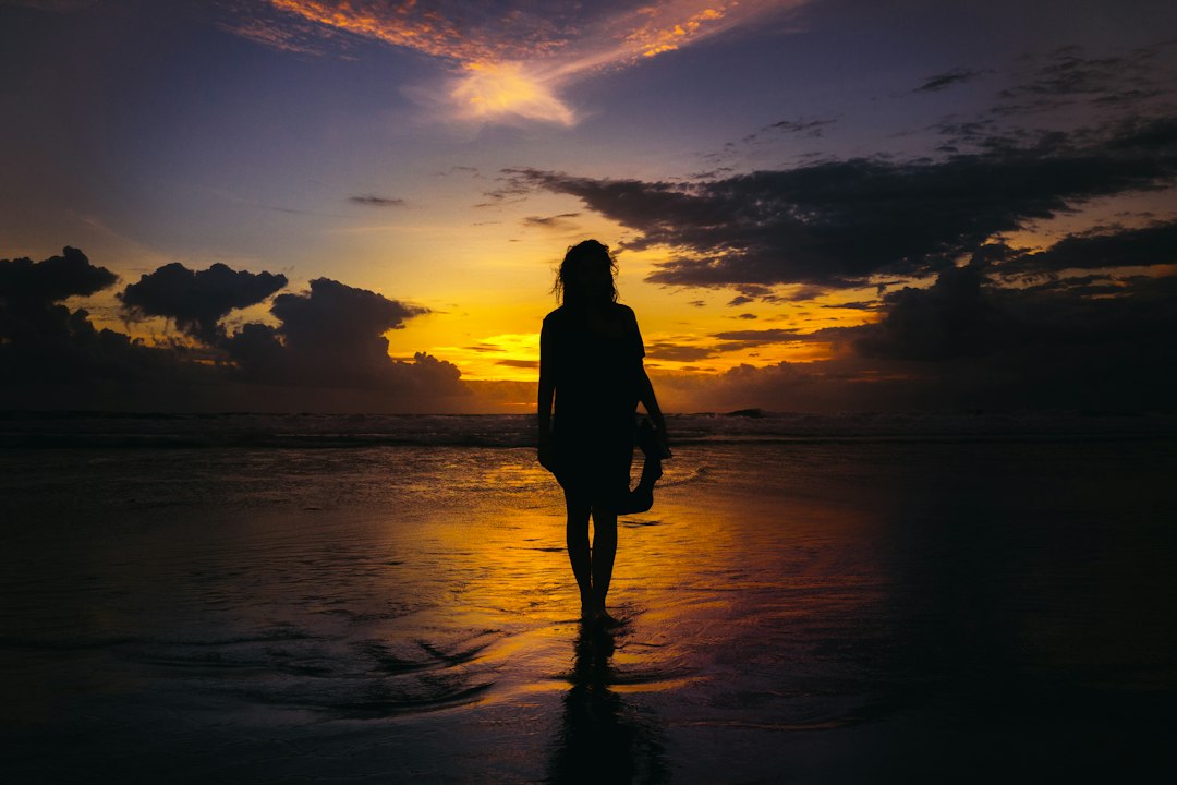 woman walking forward confident sunrise