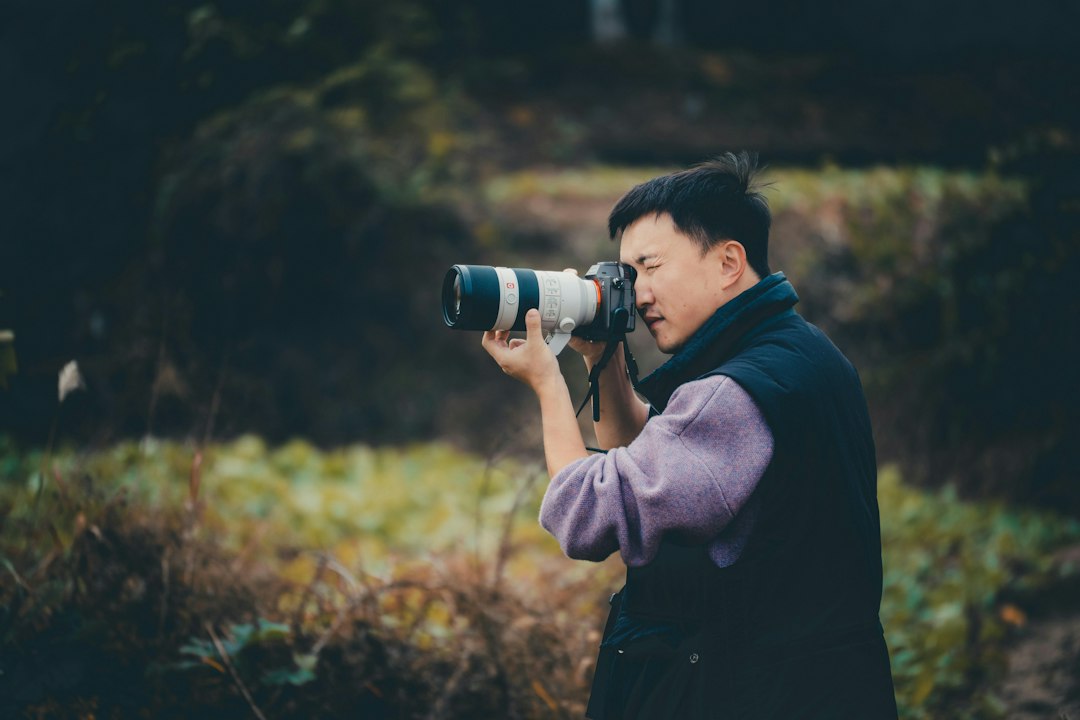 man taking profile photo outdoors